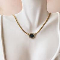 Serpentine Chain with Oval Sapphire Halo Center