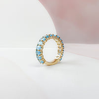 Oval Blue Topaz Almost Eternity Band